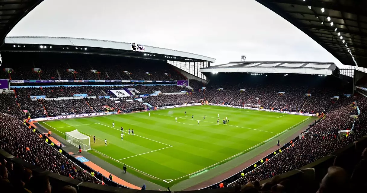 Aerial view of a packed Premier League stadium during a match