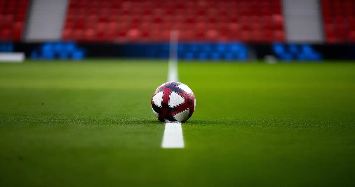 Match ball on the center spot of a Champions League pitch