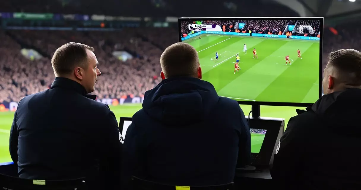Premier League VAR review in progress on pitchside monitor during weekend match