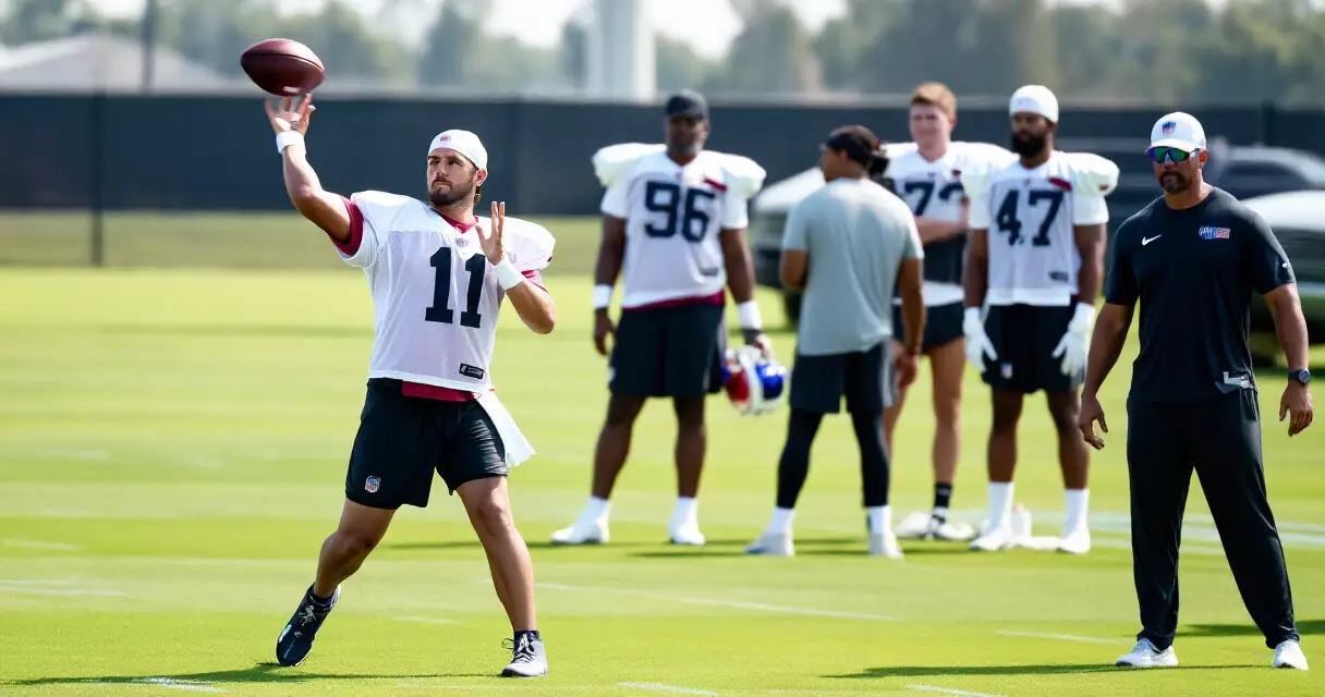 NFL quarterback at training camp practice, throwing pass during preseason drill
