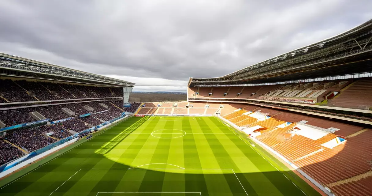 Aerial view of Premier League and La Liga stadiums showing contrasting atmospheres and architecture