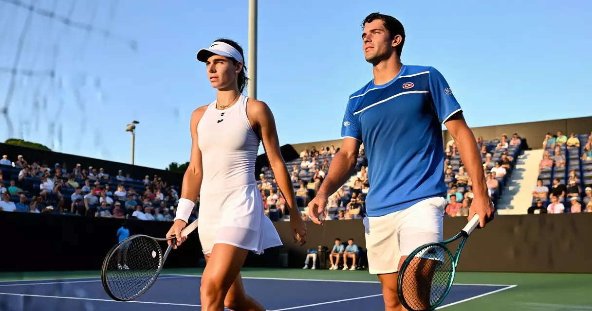Tennis mixed doubles partners walking onto a hardcourt stadium court at the US Open